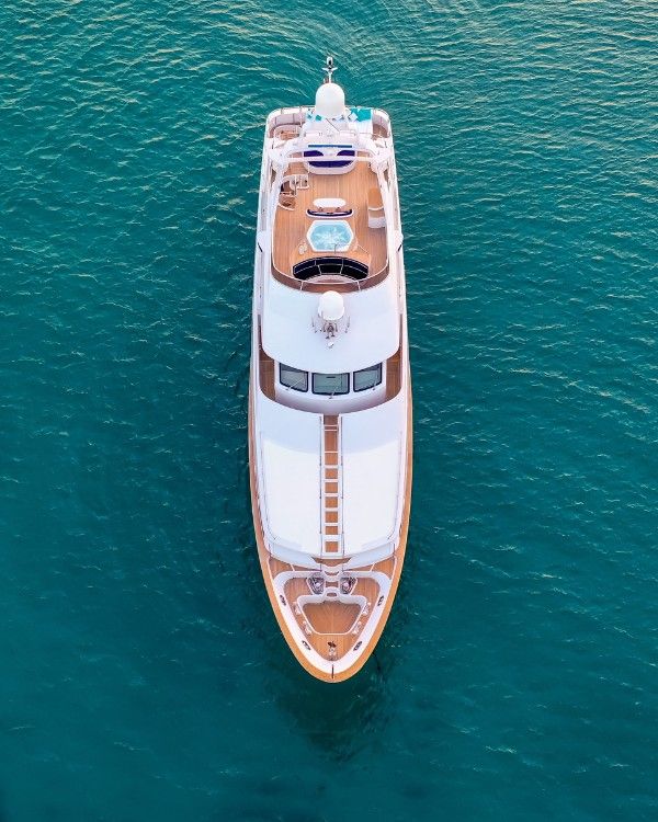 High angle shot of a white luxury yacht on the calm sea