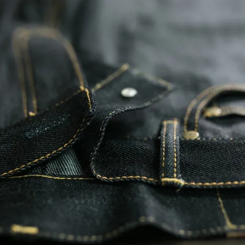 รายละเอียดเนื้อผ้าและตะเข็บของกางเกงยีนส์เดนิม