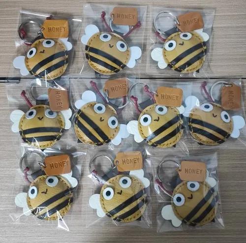 พวงกุญแจหนังแท้รูปผึ้งงานทำมือ เหมาะสำหรับแจกเป็นของชำร่วยงานแต่ง