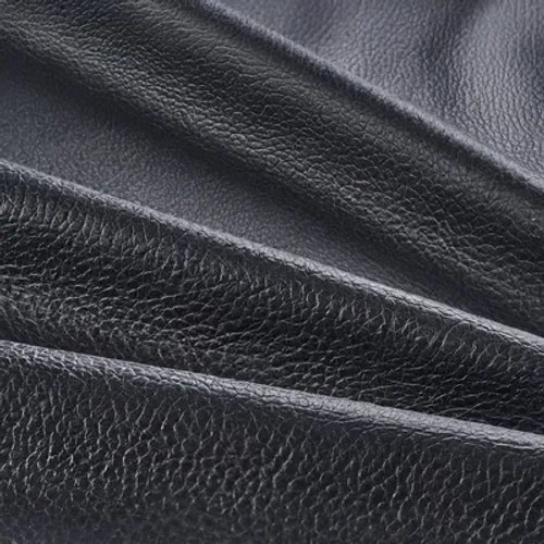 พื้นผิวหนังแท้ของกระเป๋าสีดำที่สวยงามเหนือกาลเวลา