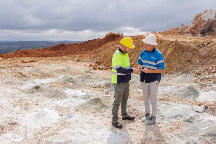 Industrial blasting crew at work on an open mine site, photographed as brand content for Brauteseth Blasting.