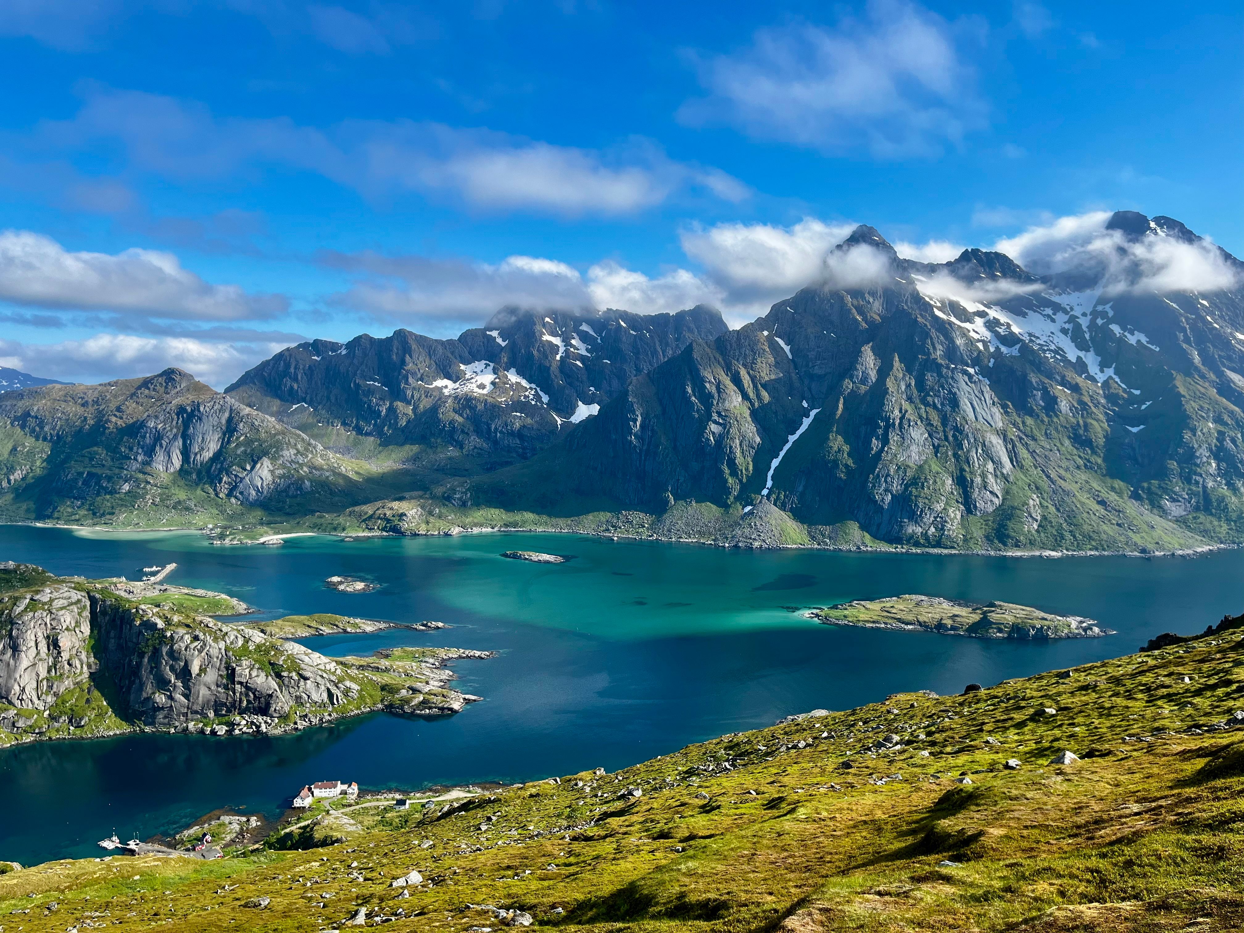 Mountains rising out of the water in Lofoten Norway