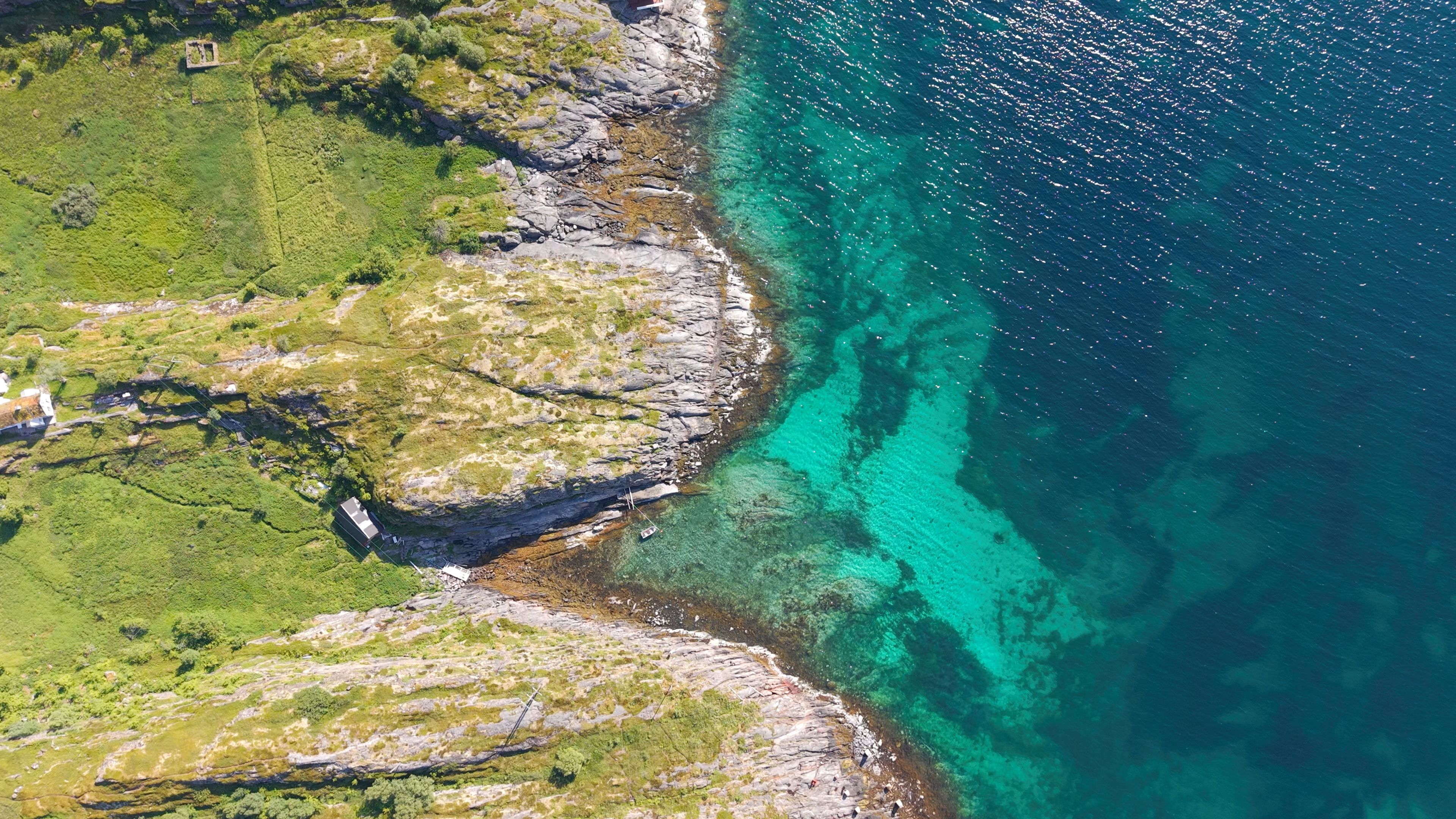 Turquoise waters seen from above in the water of Lofoten Norway