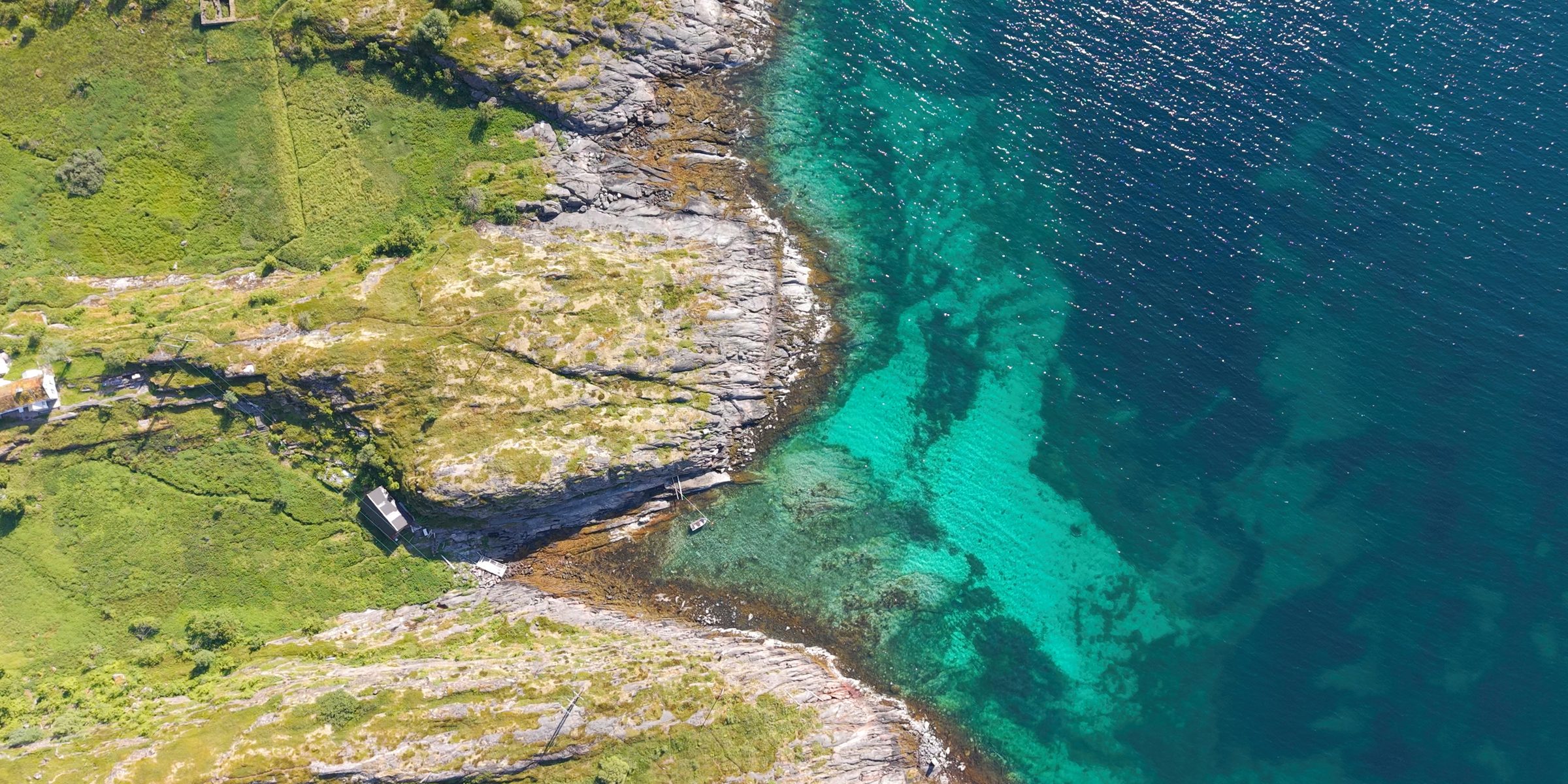 Turquoise waters seen from above in the water of Lofoten Norway