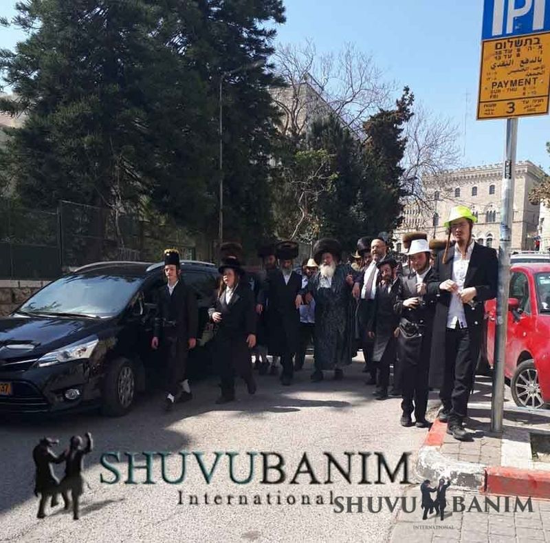 כ