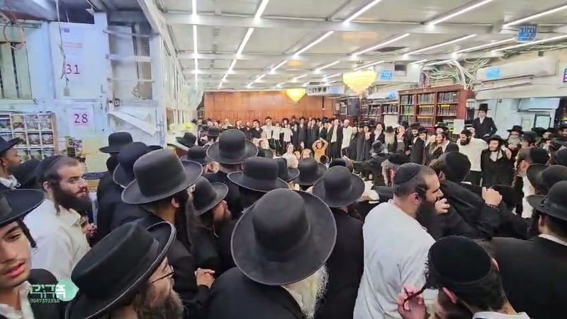 The dancing in the prayer hall at 14 Ido HaNavi Street in Jerusalem