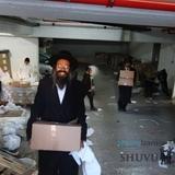 עָמַדְתָּ לָהֶם בְּעֵת צָרָתָם • חלוקת קפואים ע"י 'איחוד חסידי ברסלב' למשפחות נזקקות לקראת חג החנוכה