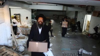 Distribution of Food Baskets to Poor Families for Chanukah by “Ichud Chasidei Breslov”