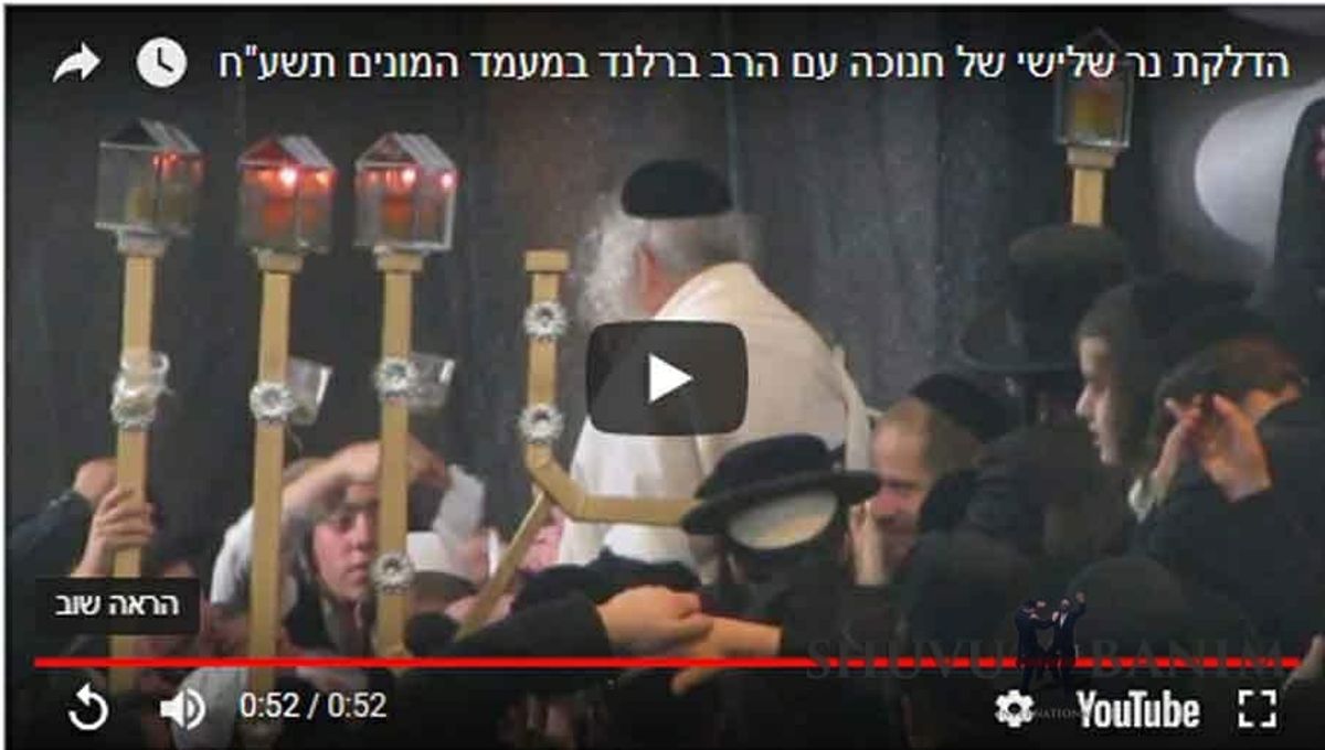 הגה"צ הרב אליעזר ברלנד שליט"א מדליק נר שלישי של חנוכה בהלל והודאה