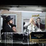 תיעוד מהדלקת נר רביעי דחנוכה אצל הגה"צ רבי אליעזר ברלנד שליט"א