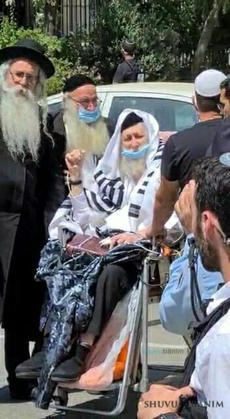 Rav Berland in wheelchair