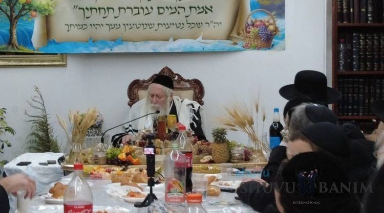 Rabbi Eliezer Berland Shlit"a with Table Set for Tu B'Shevat in his Home