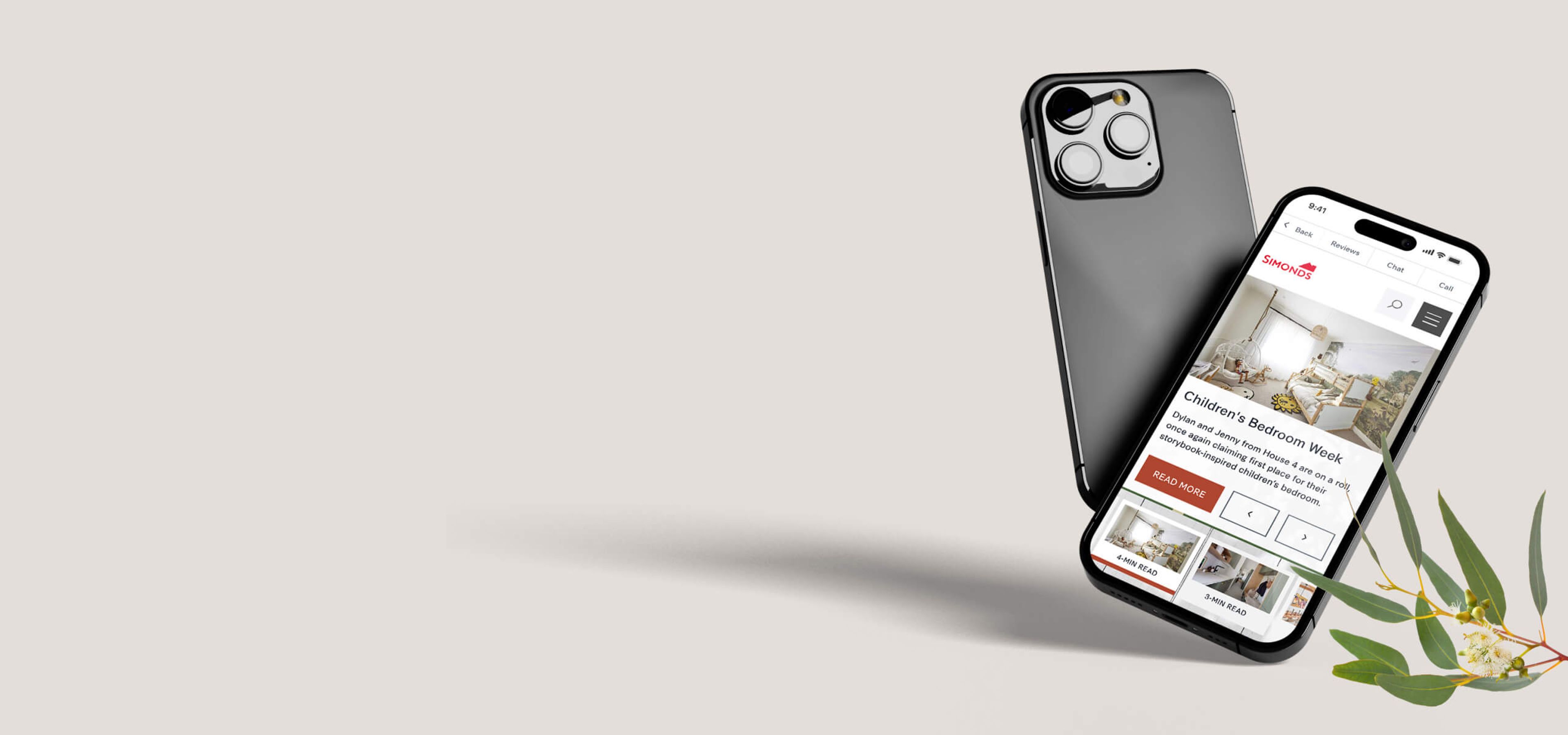 A photo of two mobile phones, one with a mockup of the Simonds Explore website.