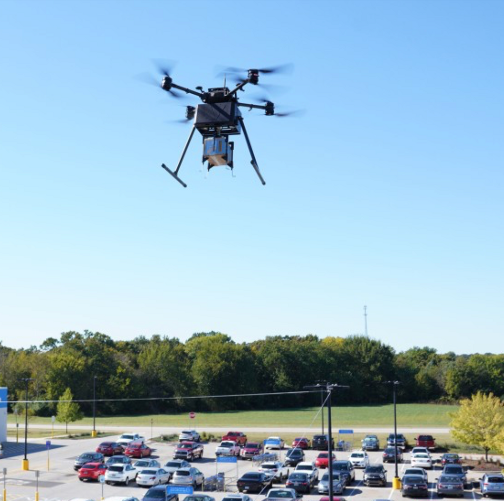 Drone flying through the parking lot