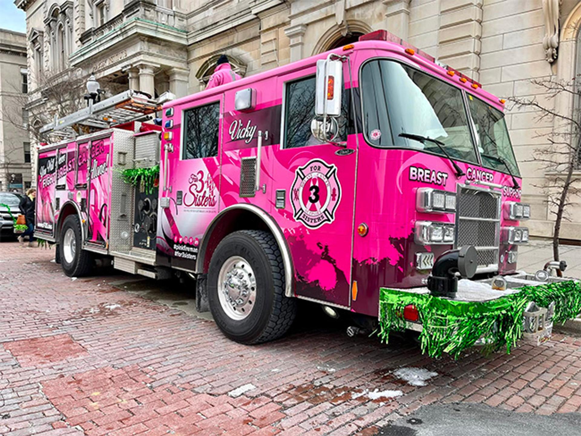 A pink-painted fire truck owned by For 3 Sisters