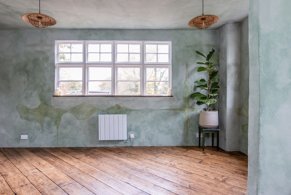 Bright reception room with large windows and painted walls at Love Locations filming location in Liss, Hampshire GU33.
