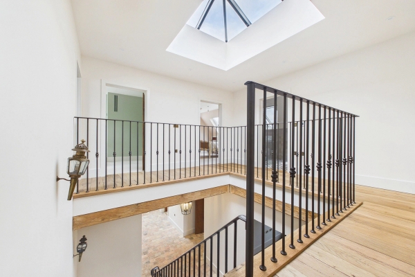 Love Locations bright landing with skylight for photography and filming
