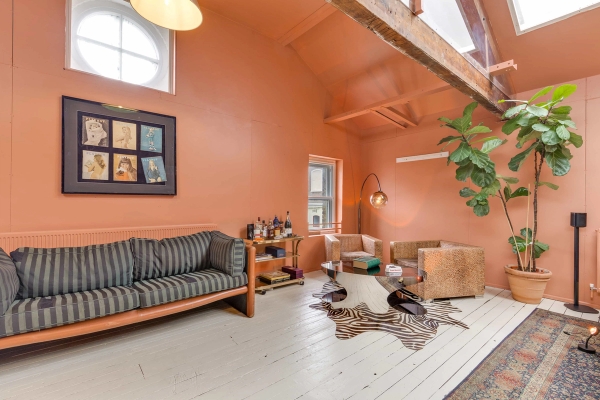 Stylized living room location space with mid-century decor and distinct architectural character, available via Love Locations Richmond.