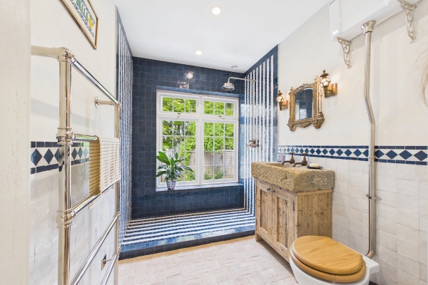 Love Locations blue and white bathroom with freestanding basin for filming