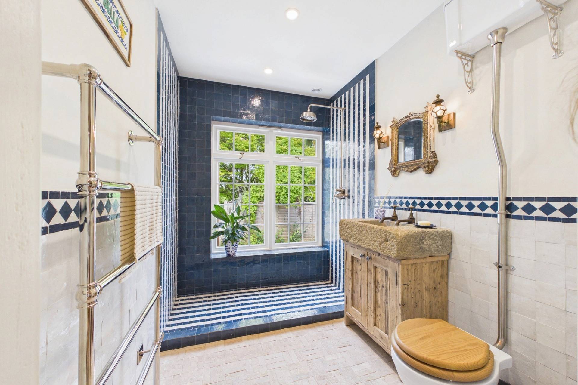 Love Locations blue and white bathroom with freestanding basin for filming