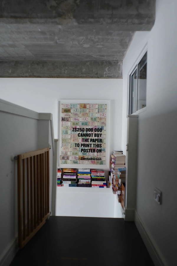 Industrial loft living space with book wall in Upper Clapton E5 – Love Locations