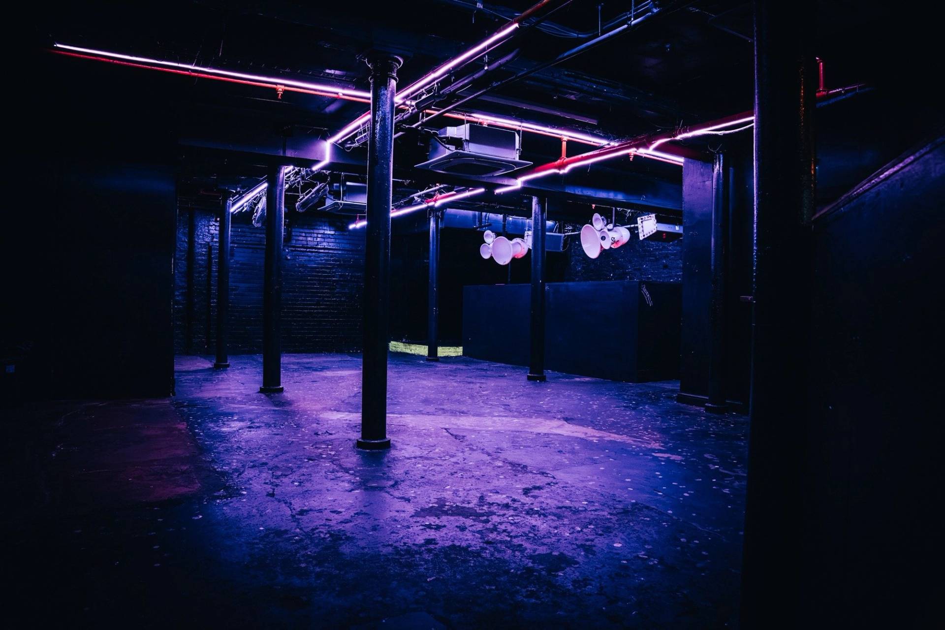 Moody purple neon lighting mood inside an underground venue shoot location in Cheetham Hill Manchester M3 from Love Locations.