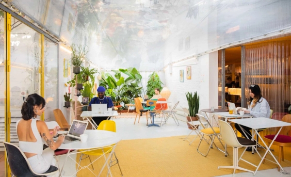 Bright W11 London workspace with flexible layout, breakout areas and yellow staircase – love locations