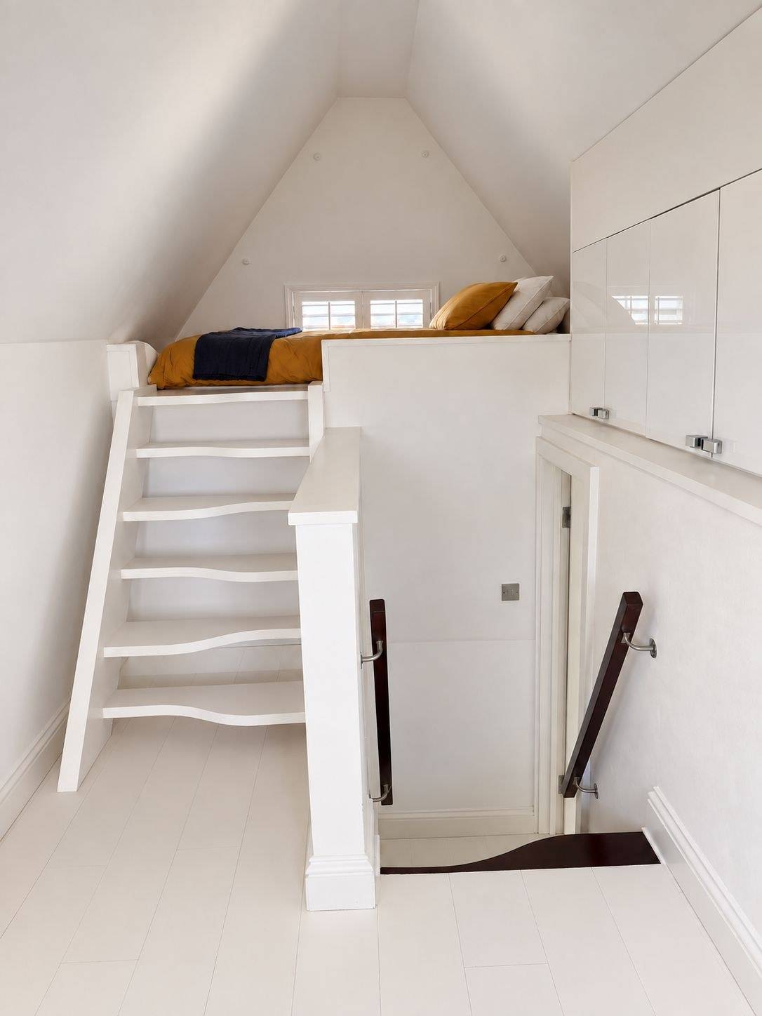 Unique mezzanine sleeping nook and access ladder inside a modern converted Victorian school shoot location in Brixton SW4 from Love Locations.