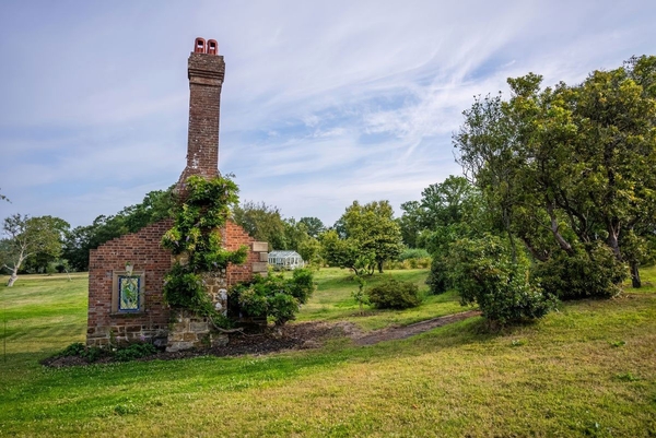 Characterful historic brick folly and chimney stack ruins set within the wilder estate grounds, unique shoot location via Love Locations.