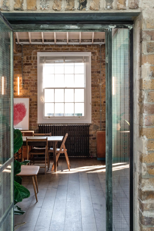 Kitchen studio with exposed brick and timber beams in Angel N1 London – love locations