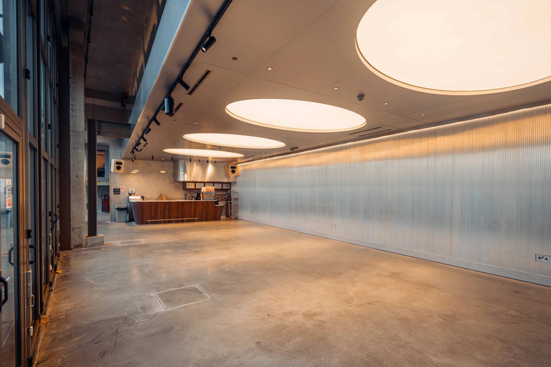 Clean open commercial event space and listening bar shoot location in Brentford TW8 through Love Locations.