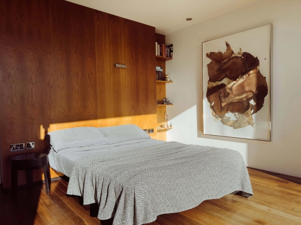 Cozy bedroom retreat at Love Locations Highgate Zen home with minimalist design.
