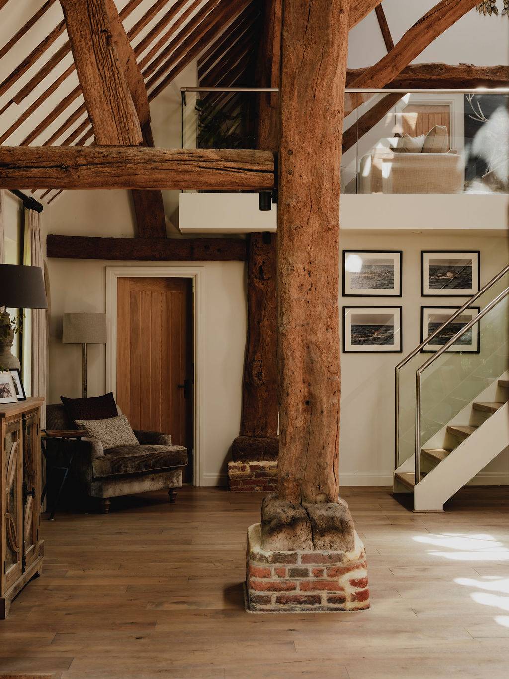 Detail of an authentic exposed wooden support post and brick pedestal in a converted Oxfordshire barn, ideal for rustic texture backdrops, Love Locations RG9.