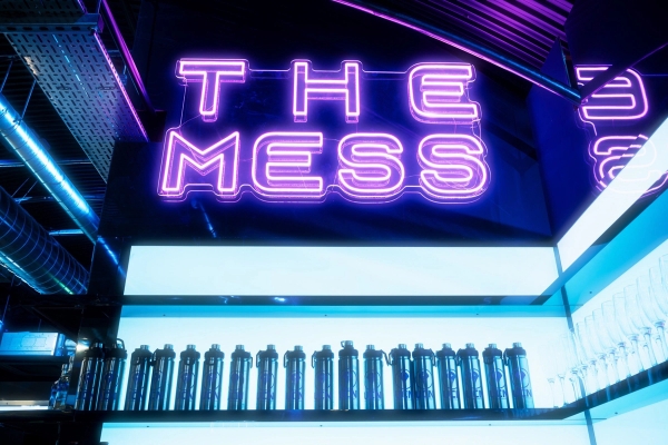 Purple neon sign reading 'The Mess' inside a futuristic spaceship bar lounge set at Albert Embankment, Love Locations.