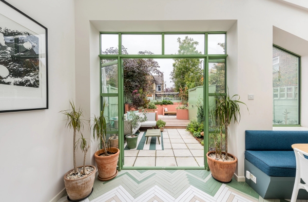 Modern bathroom with clean white tiles in North London, Love Locations