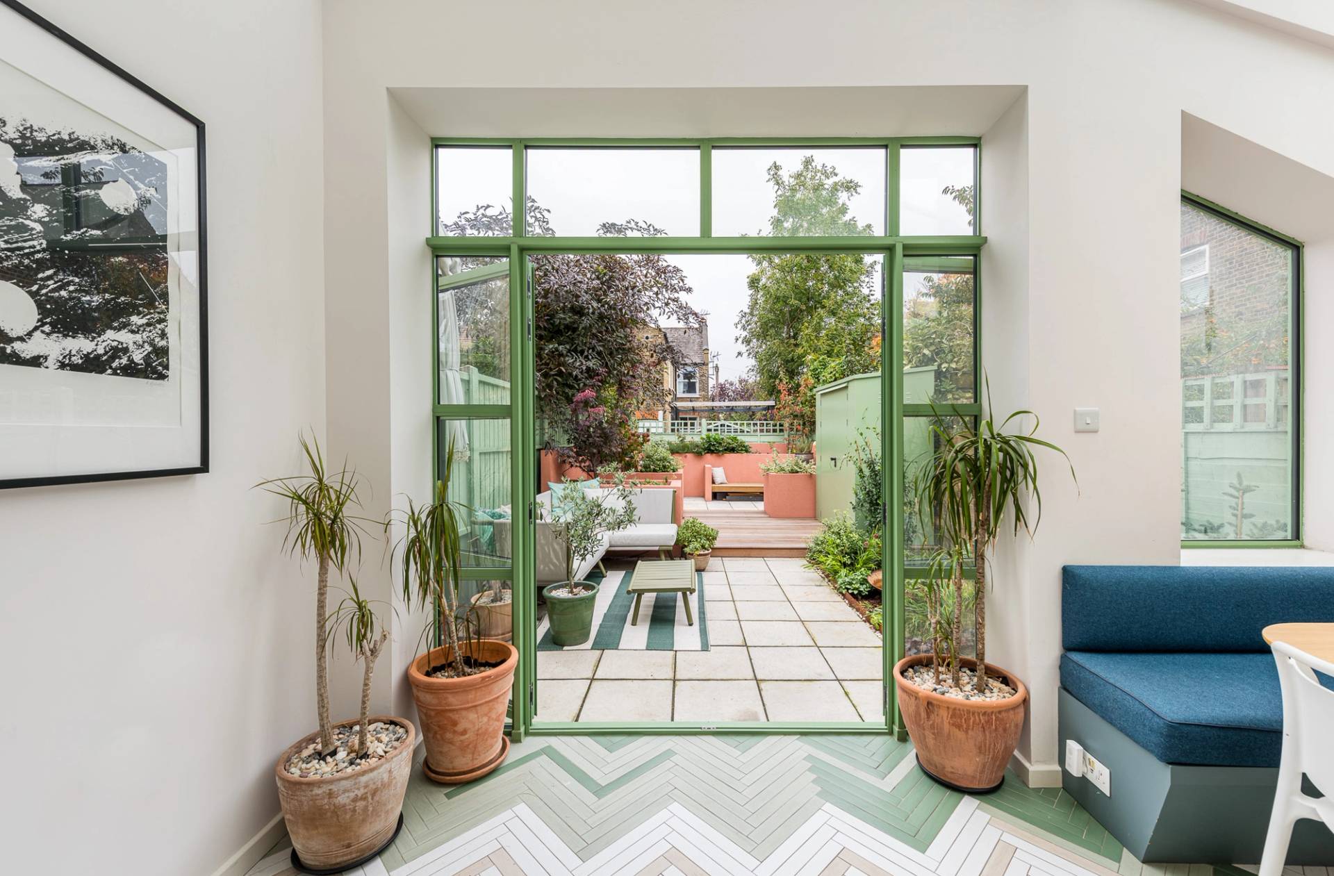 Modern bathroom with clean white tiles in North London, Love Locations