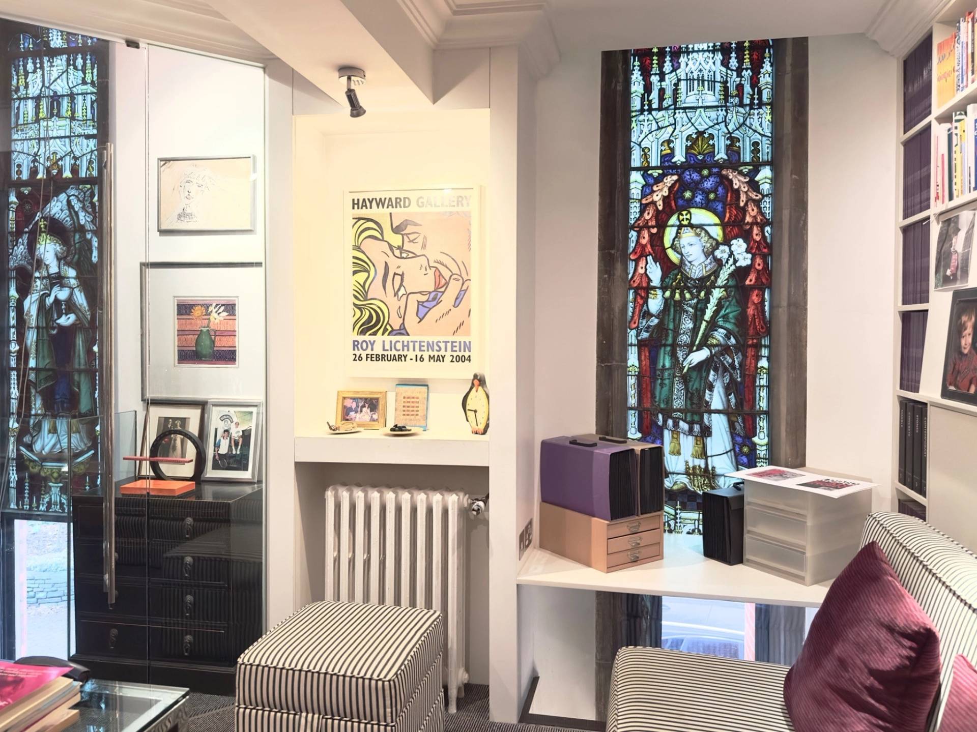 Bright room corner with original stained glass window and radiator in a converted church film location in Oval SE5 through Love Locations.