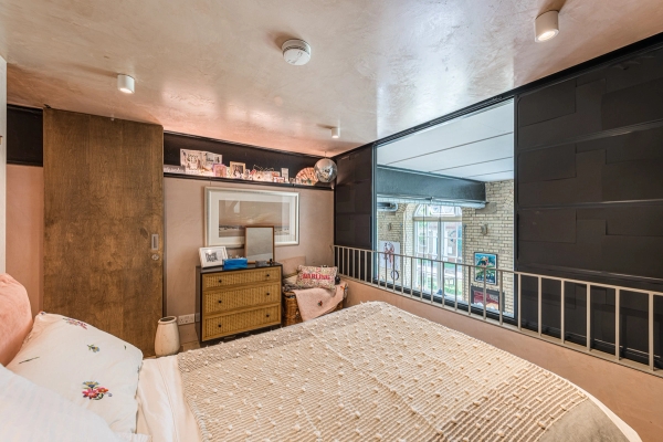 Authentic weathered yellow stock brickwork and exposed steel beam textures inside a London school conversion, Love Locations.