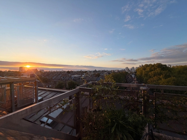 Panoramic sunset view overlooking the South London skyline from a private penthouse balcony location in Brixton SW4 by Love Locations.