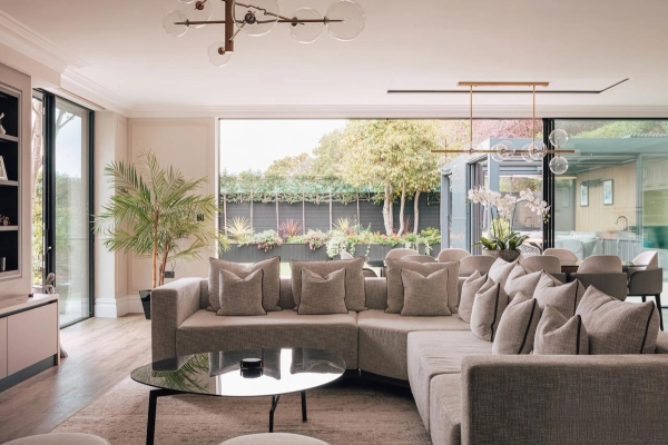 Seamless indoor-outdoor living with floor-to-ceiling sliding doors.