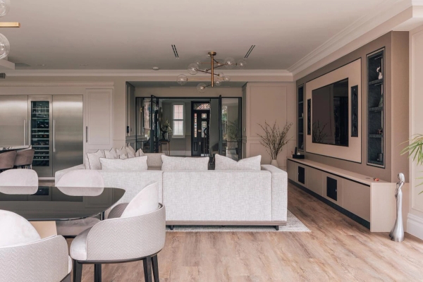 Spacious open-plan living area with a neutral color palette.
