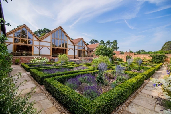 Manicured box hedging and lavender parterre gardens at Greentrees estate, an exquisite backdrop for wedding photography via Love Locations.