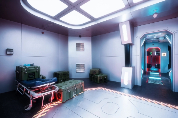 Spaceship cargo hold or armory set with tactical military crates and industrial lighting, film studio hire through Love Locations.