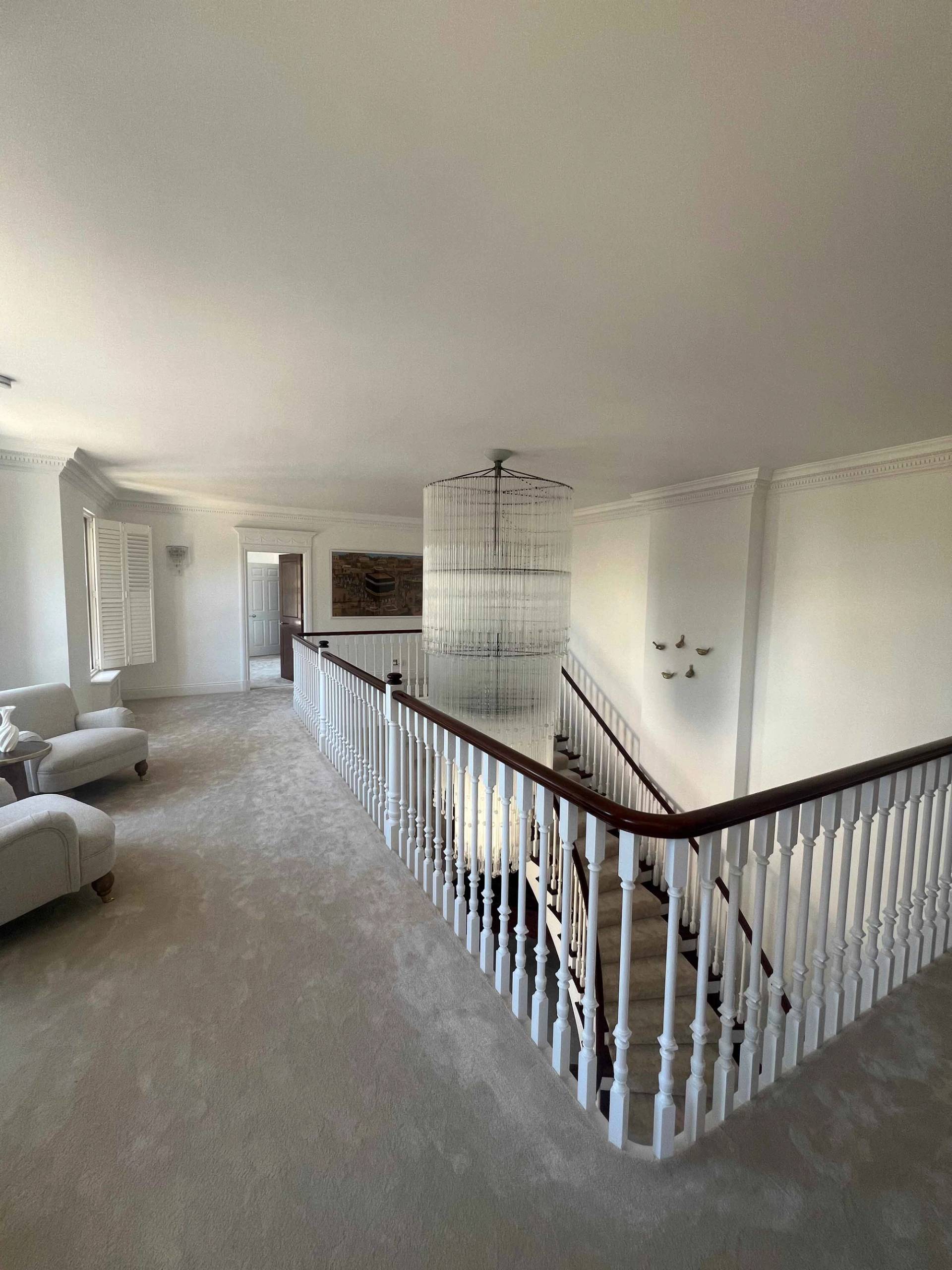 Spacious galleried landing featuring white balustrades, neutral carpet, and sash window light, Love Locations BR7.