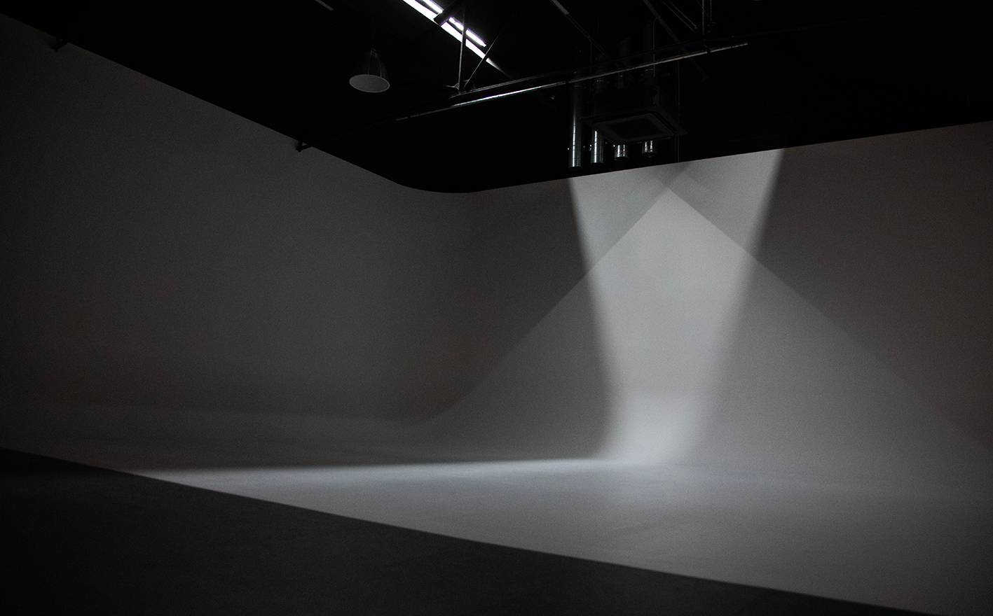 White cyclorama studio space with high ceilings in Acton W3 – Love Locations