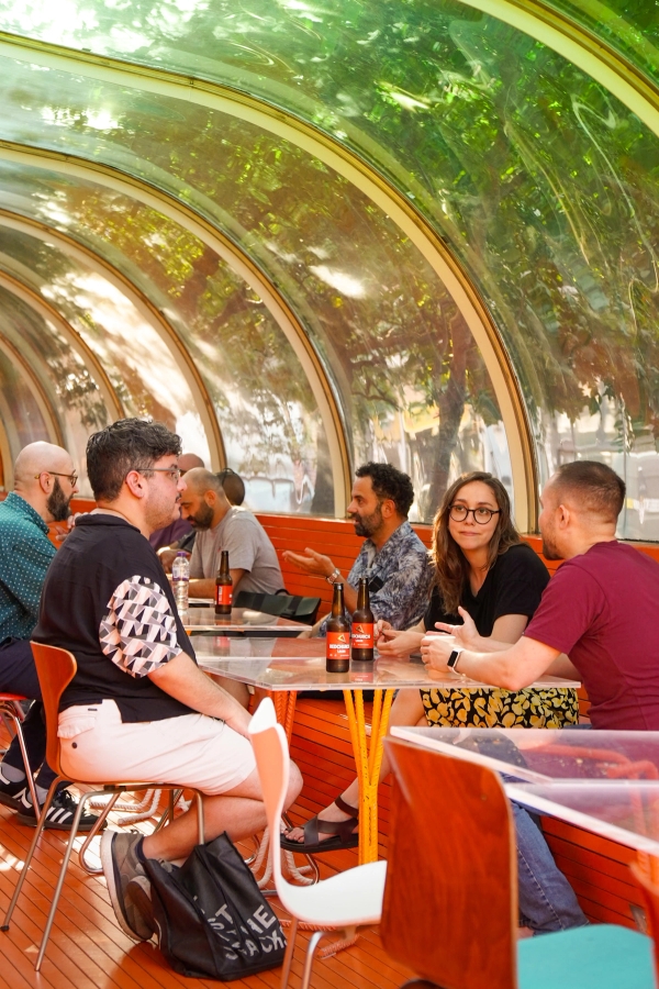 Colourful café lounge and social event space with curved architecture in Whitechapel London E1 – love locations