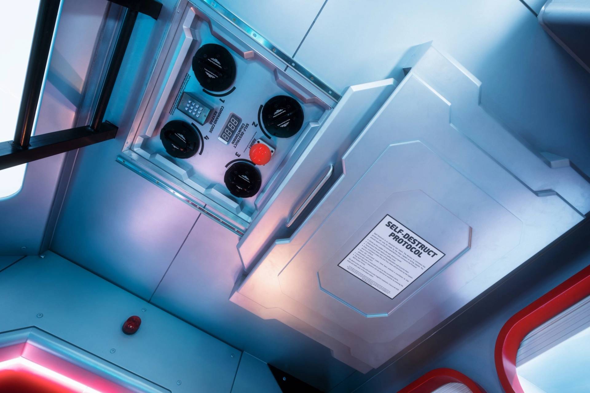 Overhead spaceship console dashboard prop with functional toggles and industrial detailing, listed by Love Locations.