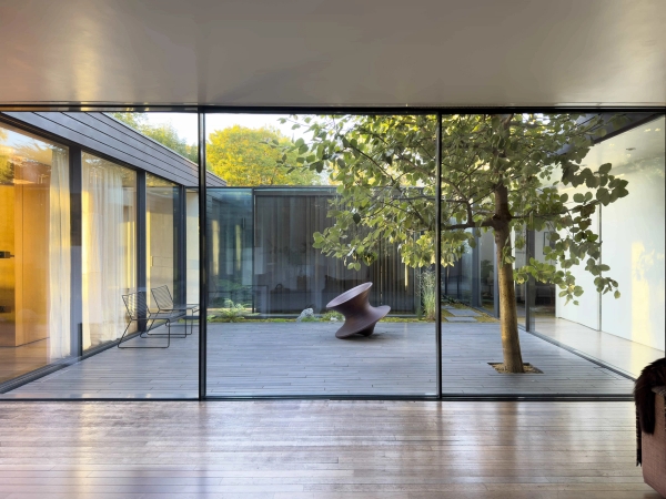 Open plan living room at Love Locations Highgate Zen modern home with natural light.
