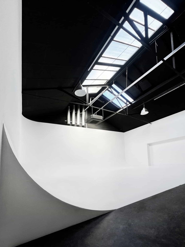 Industrial photo studio with curved cyclorama wall in Acton W3 West London – Love Locations