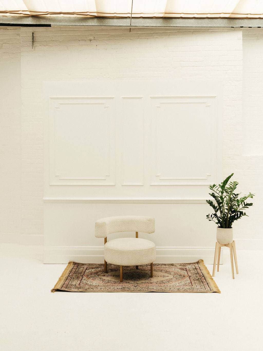 Elegant white panelled wall backdrop for weddings and private events at Brixton Warehouse Love Locations